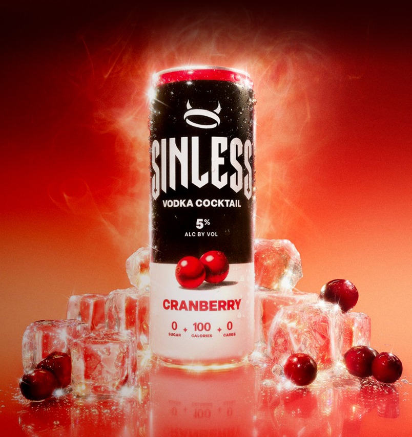A can of Sinless Cranberry Vodka Coctail sitting amongst ice.