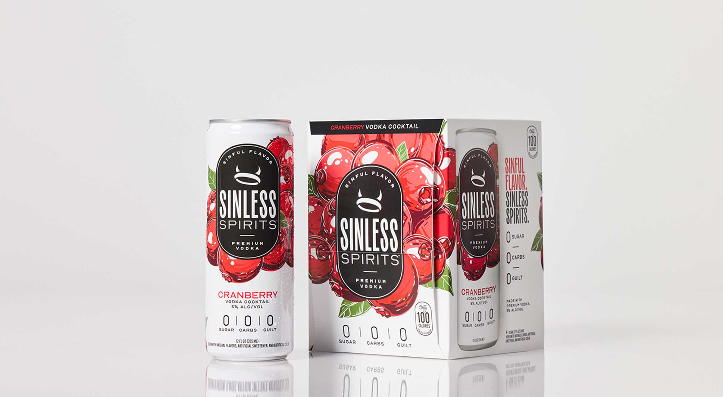 can of sinless spirits cranberry next to a 4-pack box