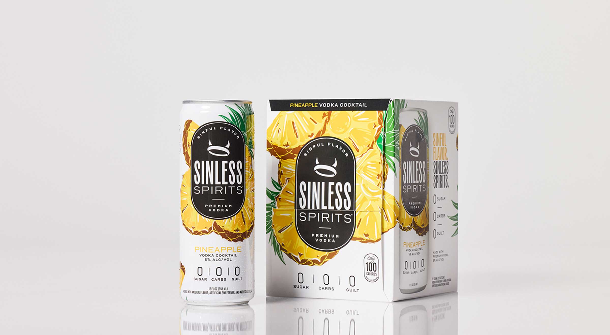 can of sinless spirits pineapple next to a 4-pack box
